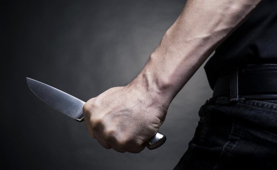 man-holding-knife